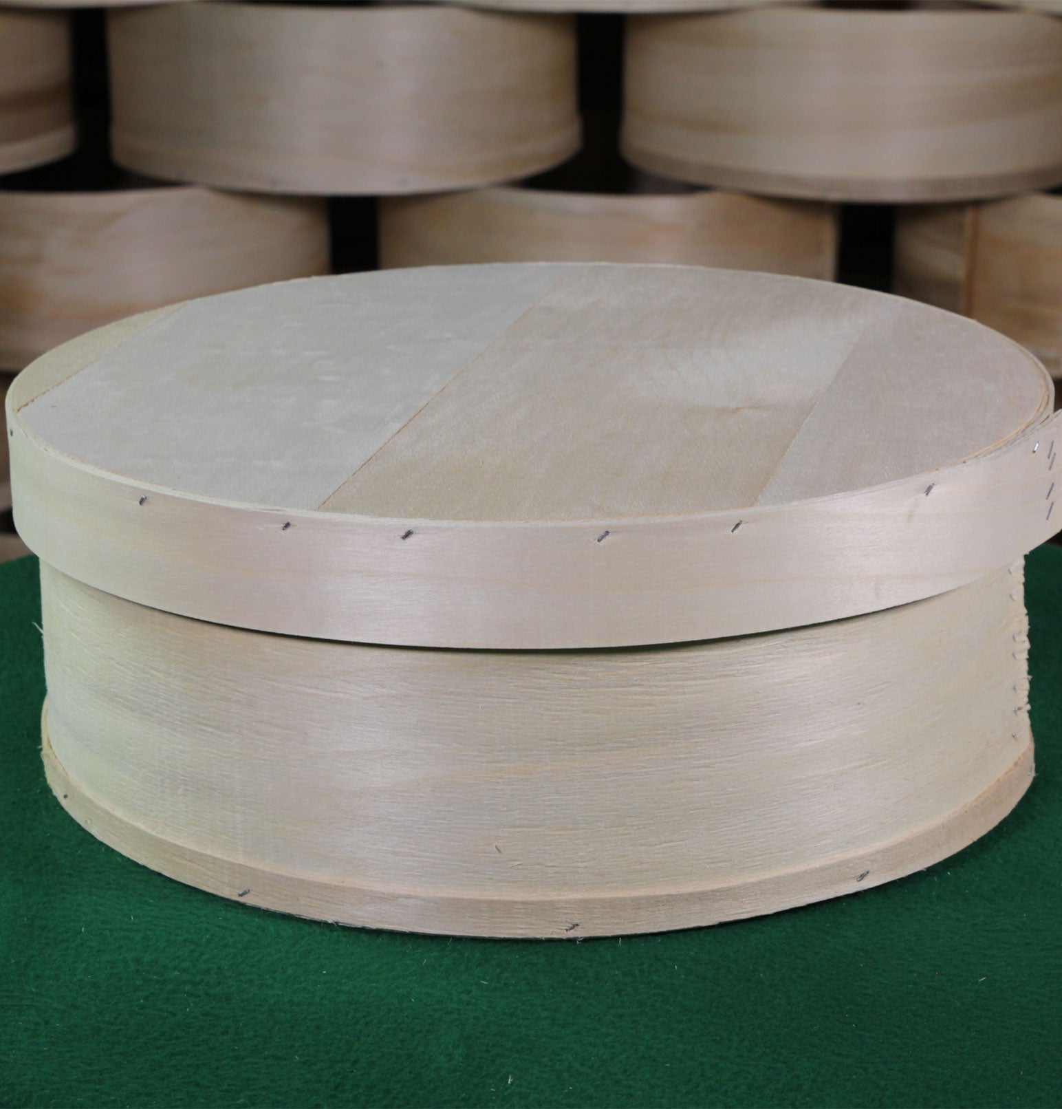 Round wooden store box with lid